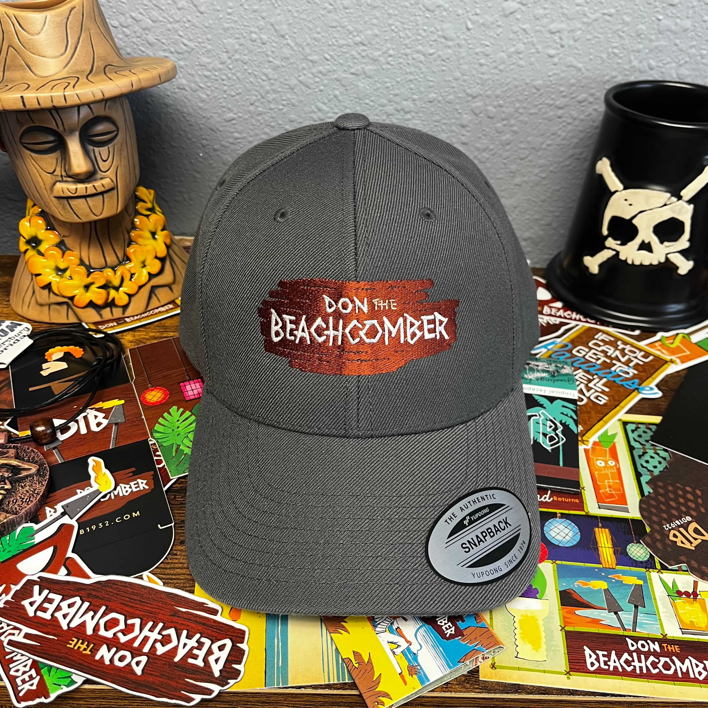 Don the Beachcomber Logo Snapback Cap In Grey