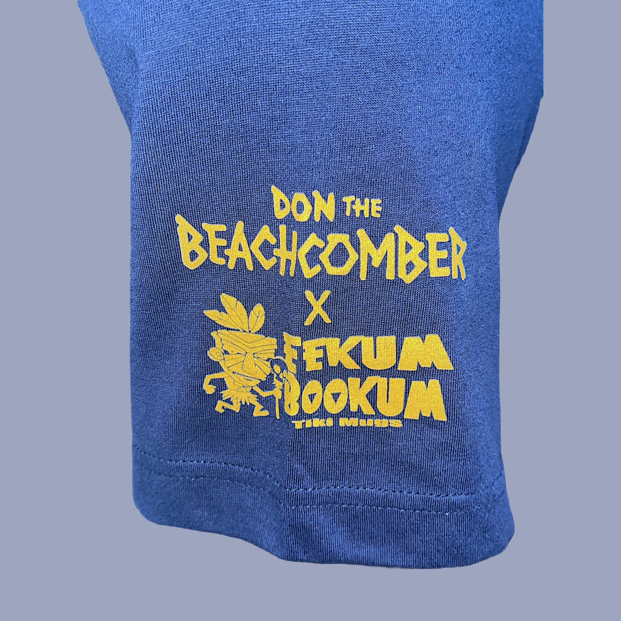 Eekum Bookum's The Legend Returns Mug Navy Blue Tee